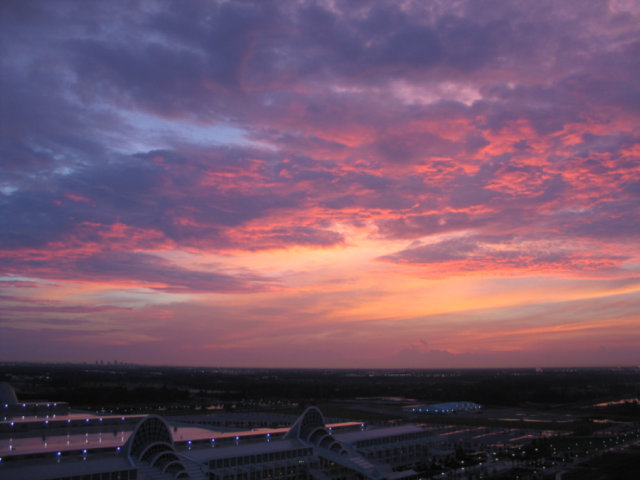 Sunset in Orlando, above a convention center.