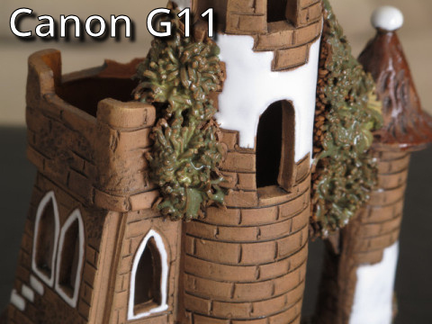 G11 zoomed in macro capture of a ceramic castle.