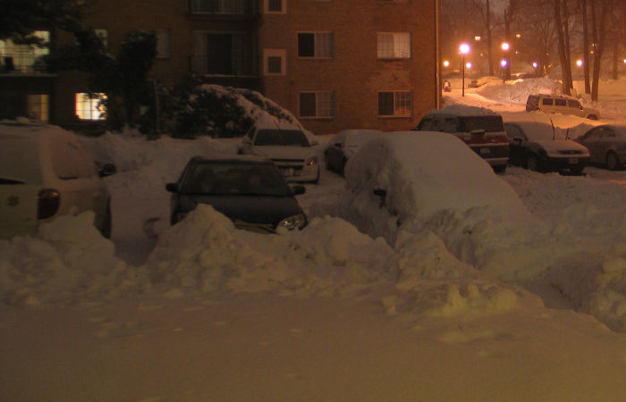 Chair appears to be rammed into the snow bank by a Civic.