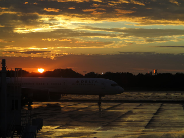 Sunset, tarmac, plane, Tampa airport.